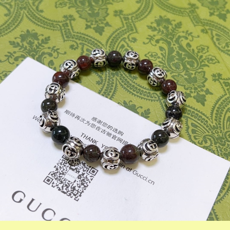 G*u*i bracelets